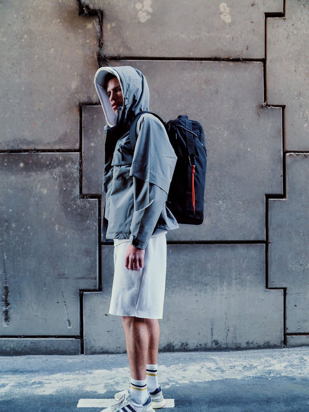 Traveller carrying a Bound backpack through the city