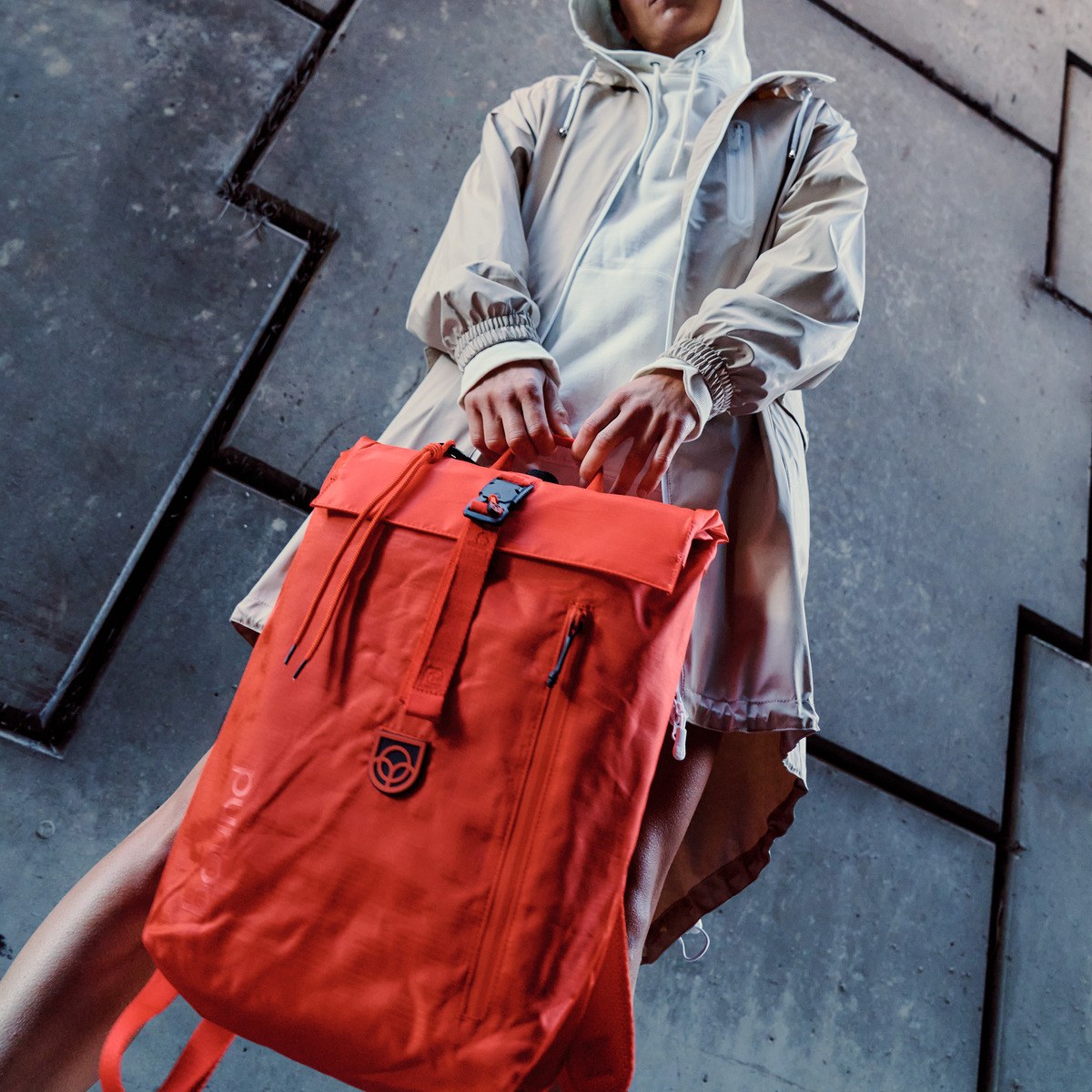 Bound Roll-Top Backpack in Flame orange – lifestyle