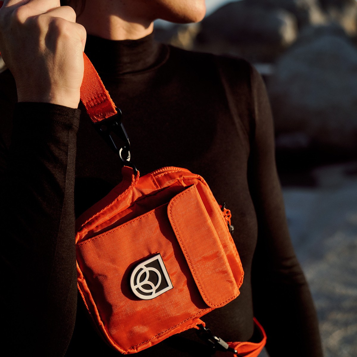 Bound Town Sling Bag in Flame orange – lifestyle