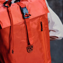 Bound Roll-Top Backpack in Flame orange – lifestyle